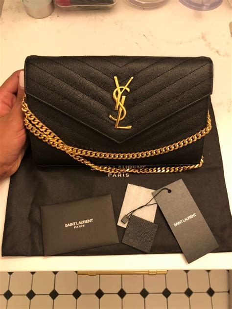 ysl chains|YSL wallet on a chain.